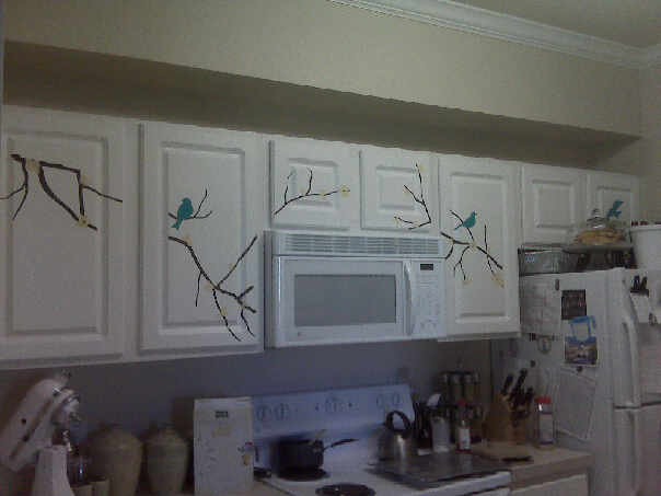 I also finally put my bird decals back up on our kitchen cabinets. I think they work even better here in our new place.